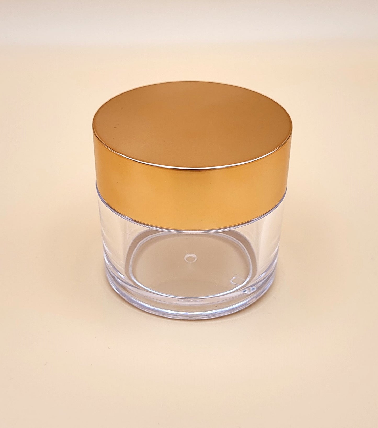 50 ml klart glas med rosa/guld skruelåg 